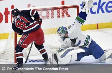 Kyle Connor scores a hat-trick against the Vancouver Canucks during NHL season 2024